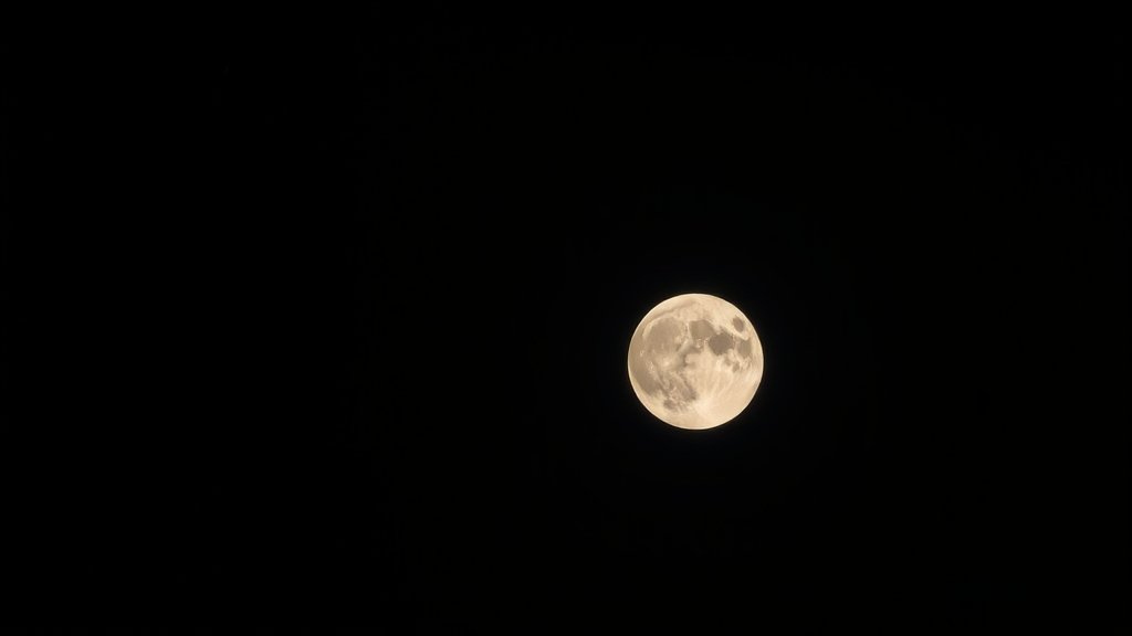 A dramatic image of a full moon with a subtle glow, set against a dark blue sky with a few stars and a hint of meteor trails in the background.