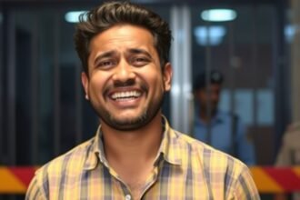 A photo of Jay Dhudhane with a mix of happiness and worry on his face, with a blurred background of a police station or a court, symbolizing his sudden shift from a celebrity life to a legal turmoil
