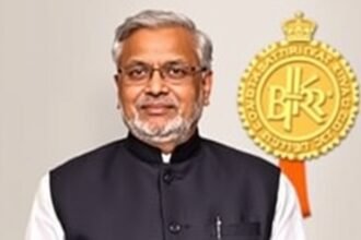 A photograph of Nitish Kumar, the Chief Minister of Bihar, with a background of the Bharat Ratna award, symbolizing the honor and prestige associated with the award.