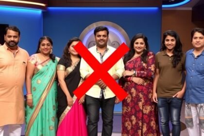 A photo of the Bigg Boss Kannada 12 contestants standing together in the house, with a bold red X marked through one of the contestants to signify elimination.